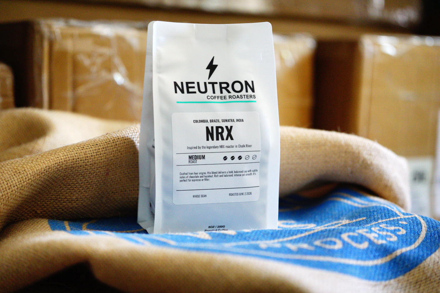 Neutron Coffee Roasters NRX coffee bag on a textured surface